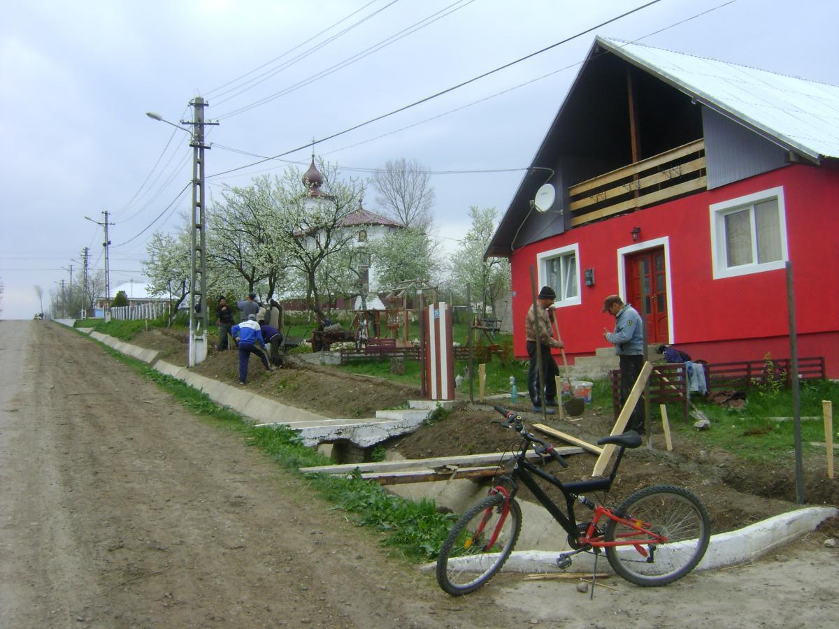 ridicarea gardului casei parohiale